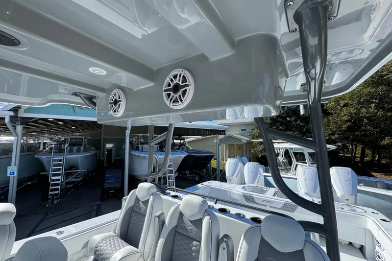 Slide: The Image of Interior view of 2026 Invincible 46 Catamaran with modern seating and audio system. - 41