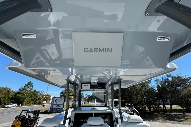 Slide: The Image of 2026 Invincible 46 Catamaran with Garmin electronics, showcasing sleek design and advanced technology. - 45