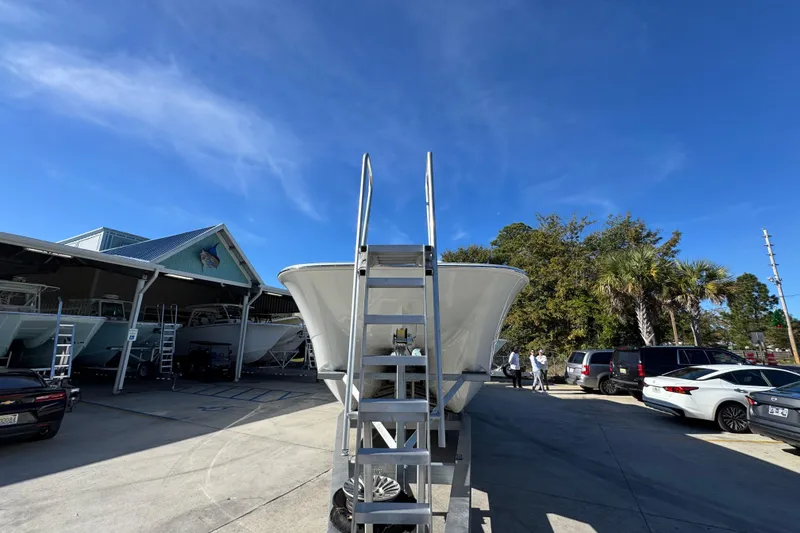 Slide: The Image of 2026 Invincible 46 Catamaran on display with clear blue sky background. - 6