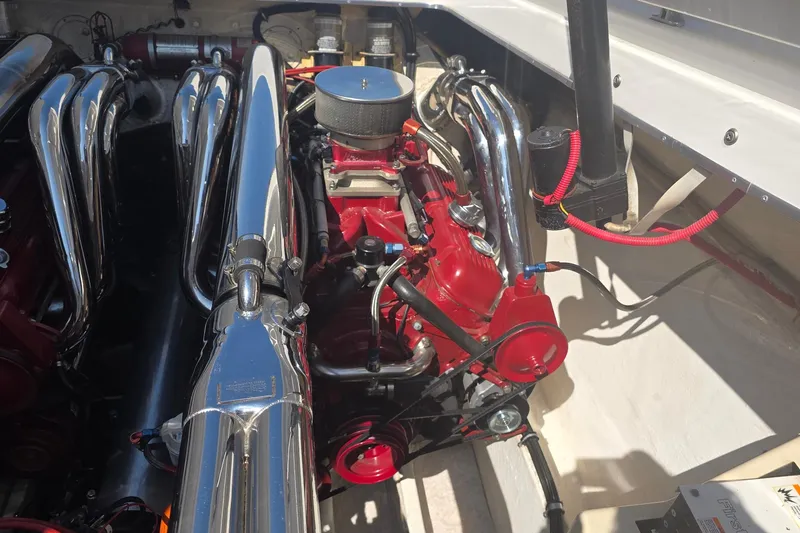 Slide: The Image of Engine compartment of a 1992 Fountain boat with polished chrome components. - 8