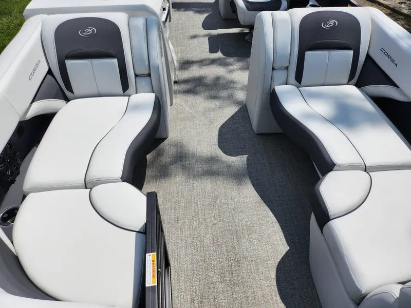 Slide: The Image of 2021 Barletta CORSA 23QC boat interior with gray and white seating. - 10