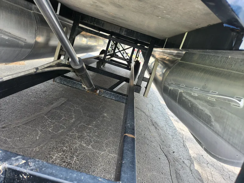 Slide: The Image of Underneath view of a 2021 Barletta CORSA 23QC pontoon boat, showcasing structural details. - 7