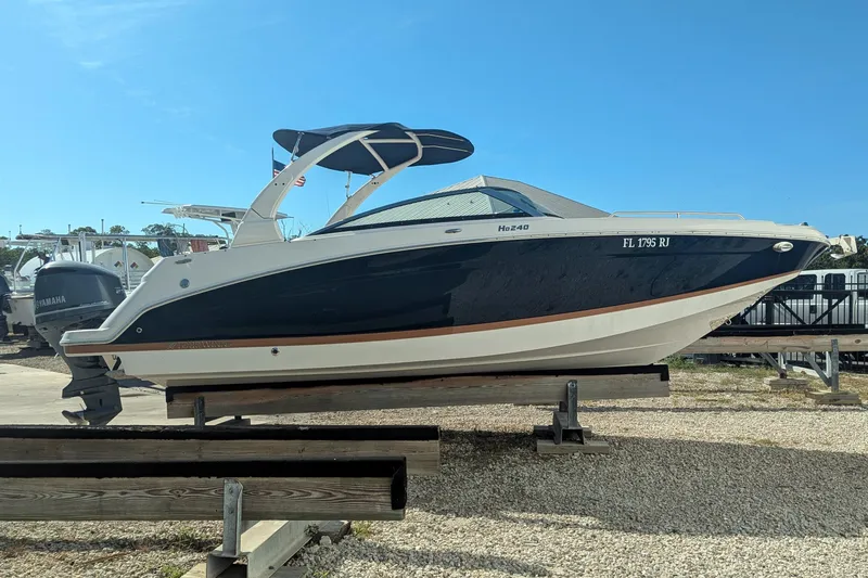 Slide: The Image of 2017 Four Winns HD240 OB boat on display, featuring sleek design and modern features. - 5