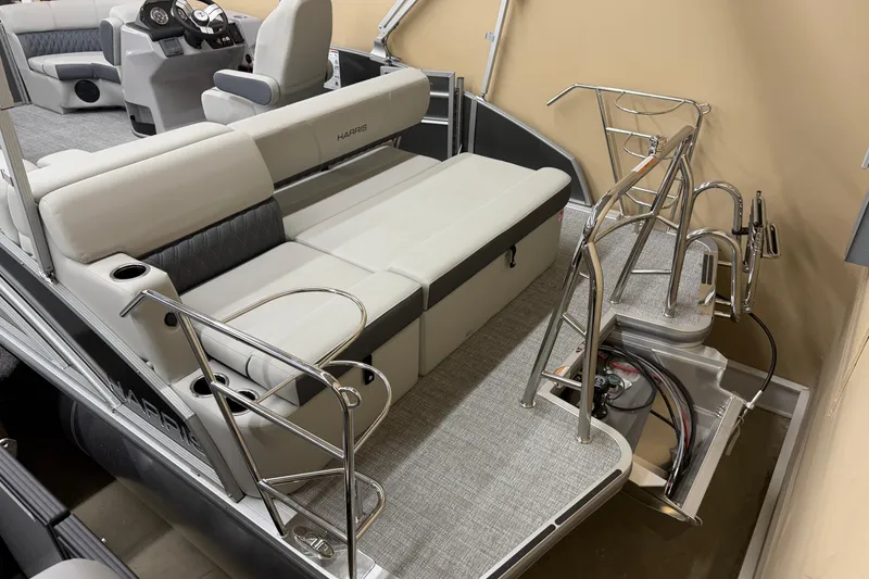 Slide: The Image of 2026 Harris Cruiser 190 pontoon boat interior with seating and helm. - 12