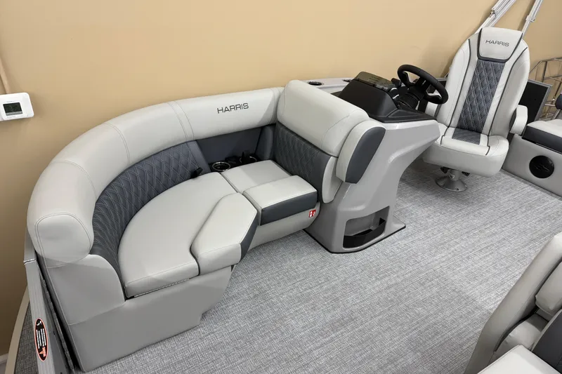 Slide: The Image of 2026 Harris Cruiser 190 interior with luxurious seating and modern helm design. - 3