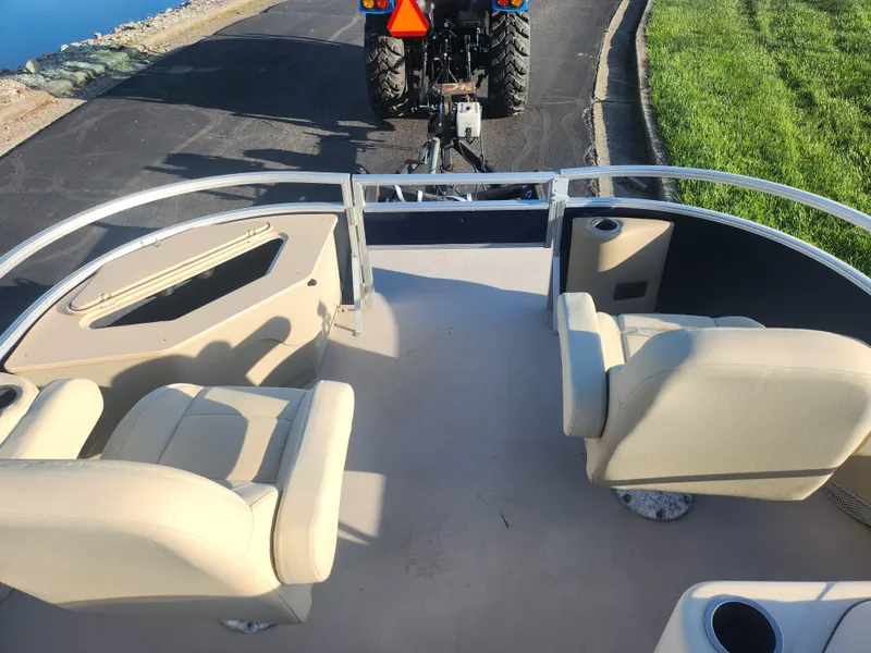 Slide: The Image of 2018 SunChaser Geneva Cruise 22 DLX 4.0 Fish boat interior with beige seating. - 24