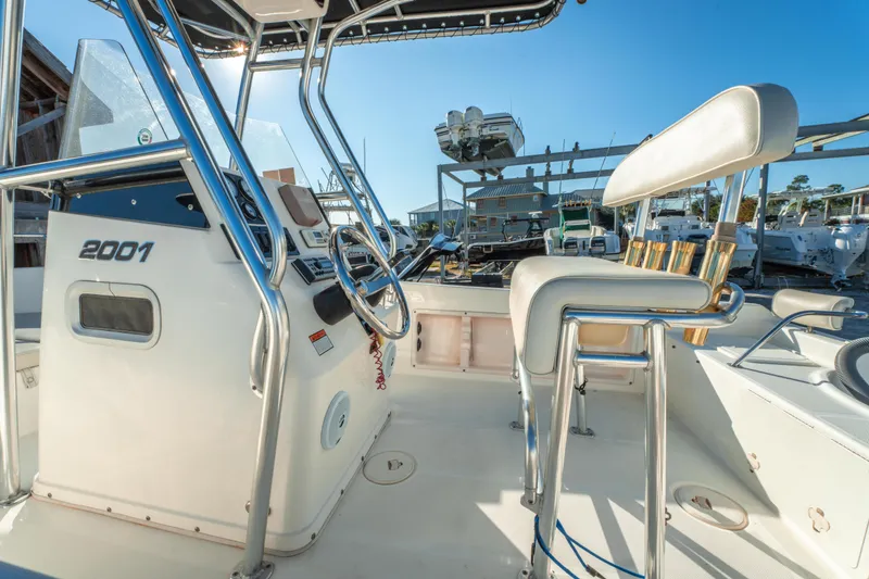 Slide: The Image of Century 2001 model boat interior with steering wheel and seating, year 2006. - 12