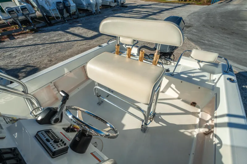Slide: The Image of Century 2001 model boat interior, featuring steering wheel and seating, photographed in 2006. - 16