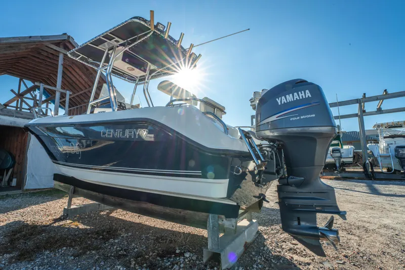 Slide: The Image of Century 2001 boat with Yamaha engine, 2006 model, in sunny outdoor setting. - 6