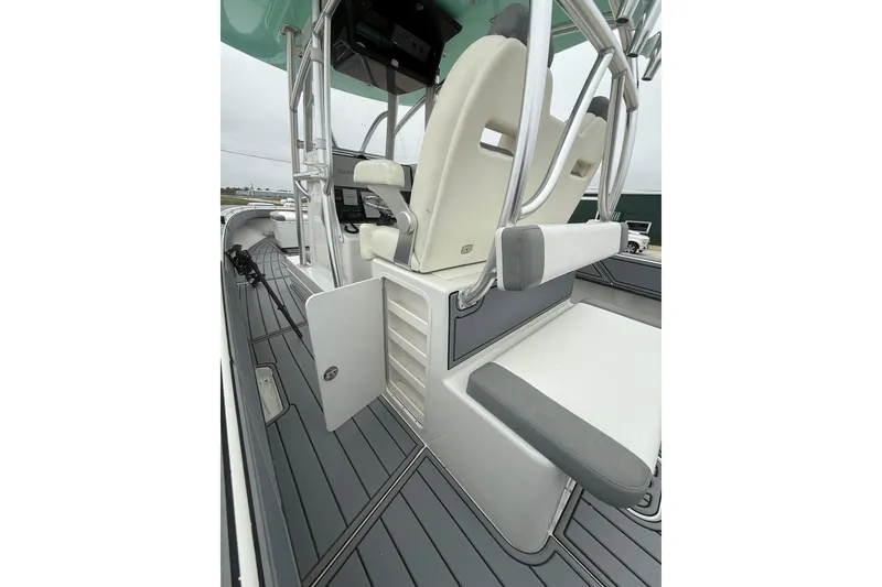 Slide: The Image of 2008 Contender 36 Open boat interior with seating and storage compartments. - 21