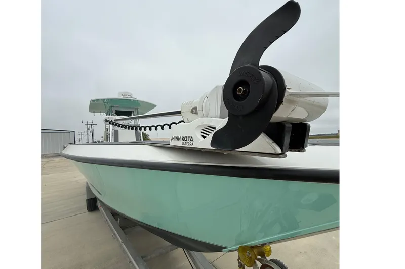 Slide: The Image of 2008 Contender 36 Open boat with Minn Kota Ulterra motor on trailer. - 3