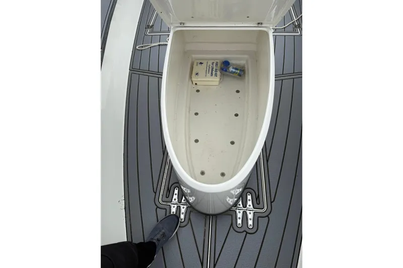 Slide: The Image of Open storage compartment on 2008 Contender 36 Open boat deck. - 6