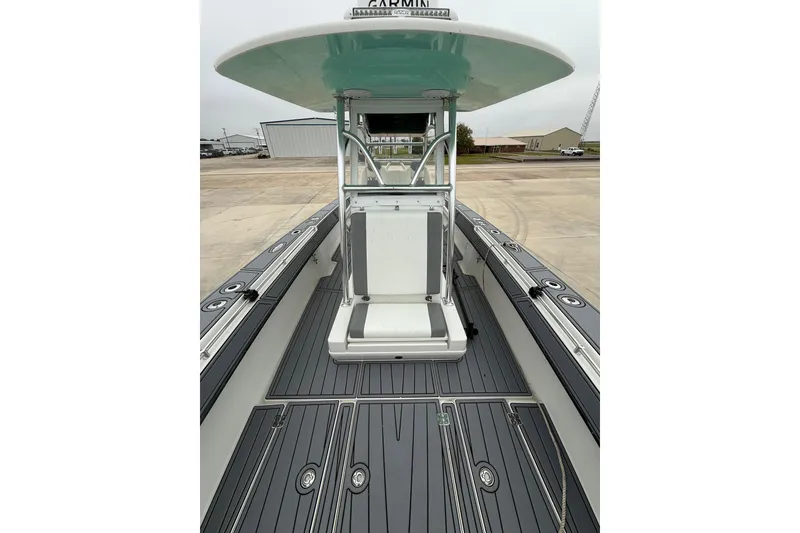 Slide: The Image of 2008 Contender 36 Open boat interior with sleek deck and modern console design. - 7