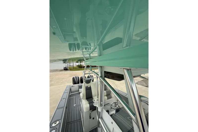 Slide: The Image of 2008 Contender 36 Open boat interior with sleek seating and modern design. - 9