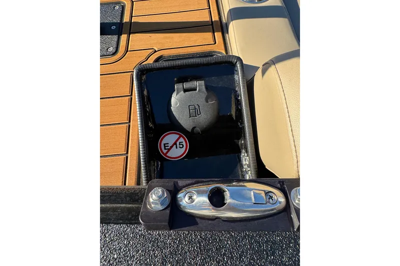 Slide: The Image of 2026 SeaArk Big Easy boat fuel cap with E15 warning label. - 31