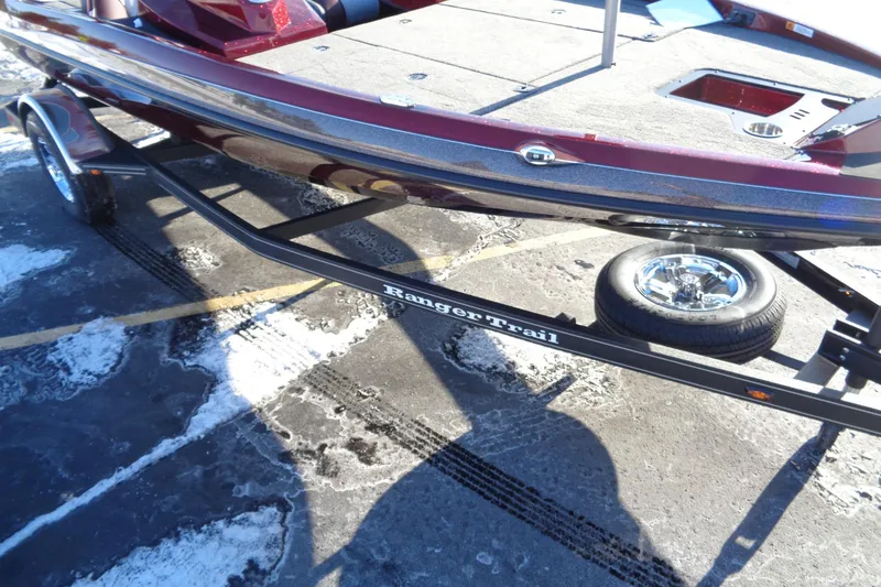 Slide: The Image of 2026 Ranger Z185 boat on Ranger Trail trailer in snowy parking lot. - 15