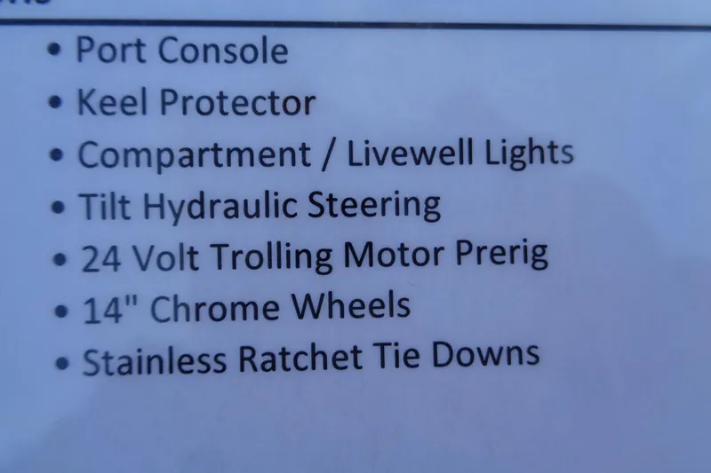 Slide: The Image of 2026 Ranger Z185 features: port console, keel protector, hydraulic steering, trolling motor, chrome wheels. - 21