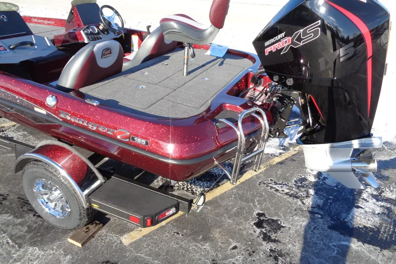 Slide: The Image of 2026 Ranger Z185 boat with Mercury Pro XS 175 engine, parked on a trailer. - 3