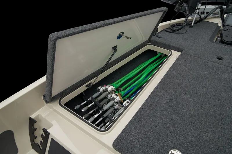 Slide: The Image of Manufacturer Provided Image: 2026 Ranger Z185 boat with open storage compartment holding fishing rods. - 46