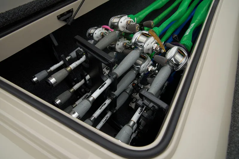 Slide: The Image of Manufacturer Provided Image: Fishing rods stored in a Ranger Z185 boat compartment, 2026 model. - 47