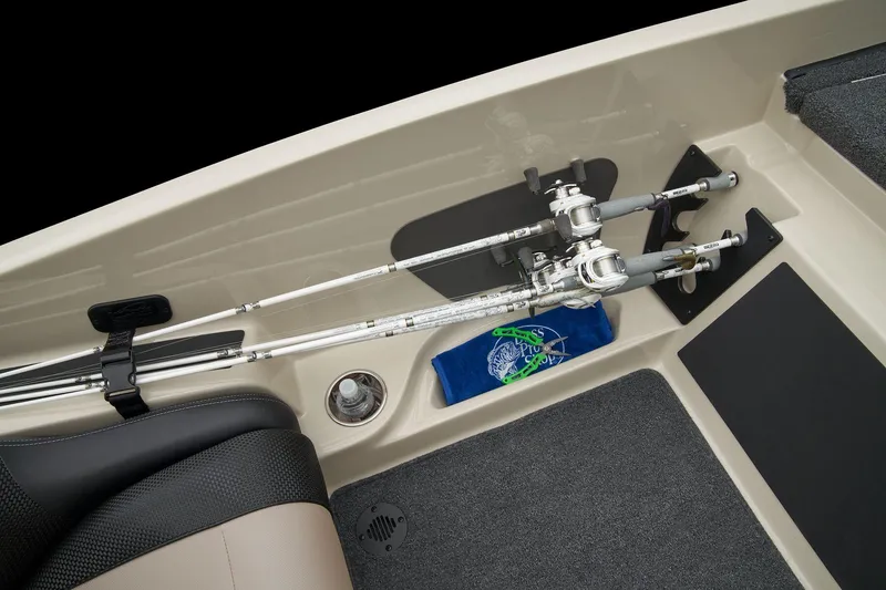 Slide: The Image of Manufacturer Provided Image: 2026 Ranger Z185 boat interior with fishing rod holders and storage compartment. - 67