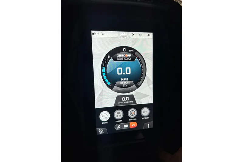 Slide: The Image of Touchscreen display of a 2023 Tigé 23ZX boat showing speed and control settings. - 14