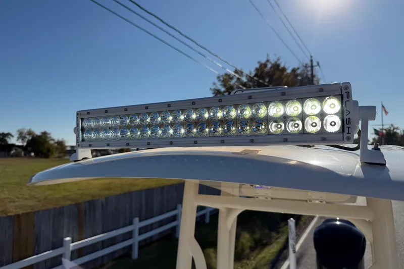 Slide: The Image of LED light bar on 2014 Pathfinder 2400 TRS boat under clear sky. - 21