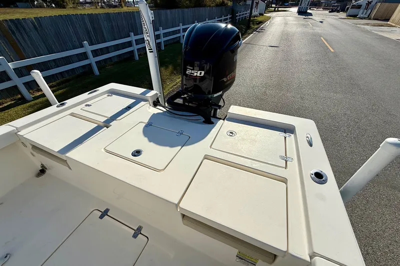 Slide: The Image of 2014 Pathfinder 2400 TRS boat with Yamaha 250 engine, docked on a sunny day. - 8
