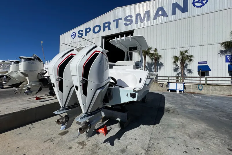 Slide: The Image of 2022 Front Runner 26 Center Console boat with dual engines at Sportsman facility. - 13