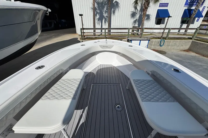 Slide: The Image of 2022 Front Runner 26 Center Console boat with spacious seating and sleek design. - 17