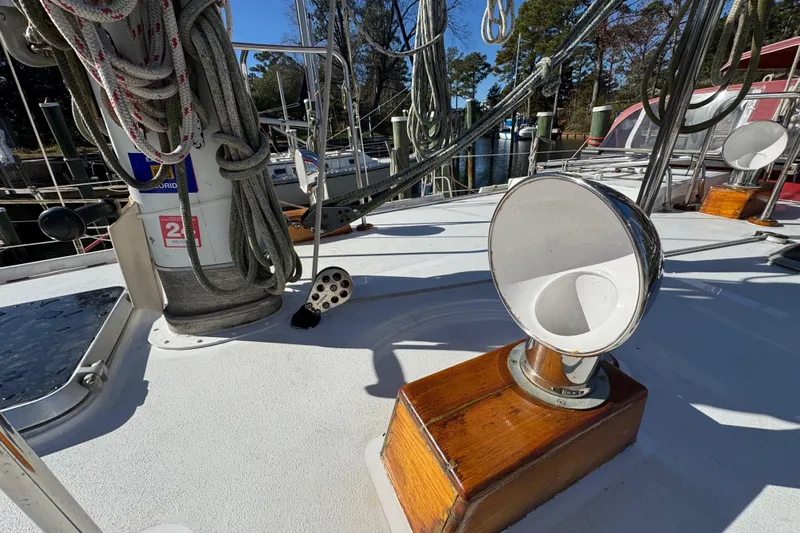 Slide: The Image of Deck of 1997 Creekmore Cutter sailboat with ropes and ventilation cowl. - 32
