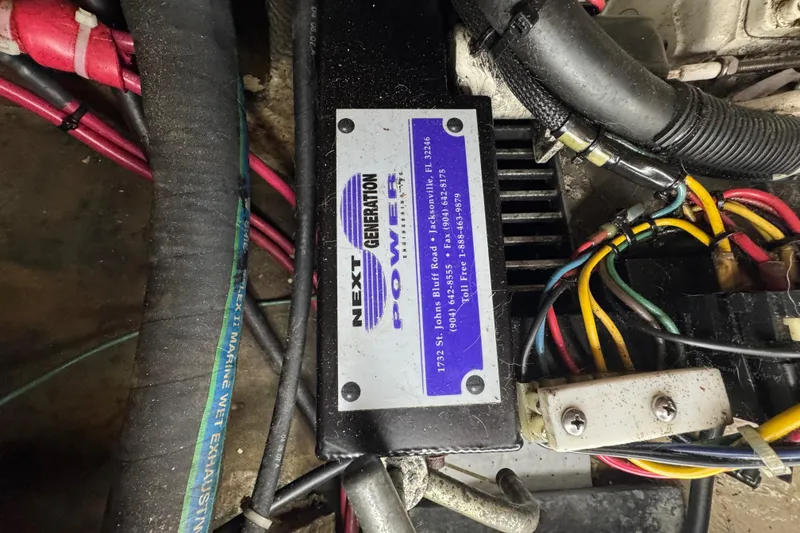 Slide: The Image of Electrical wiring and components inside a 1997 Creekmore Cutter boat. - 98