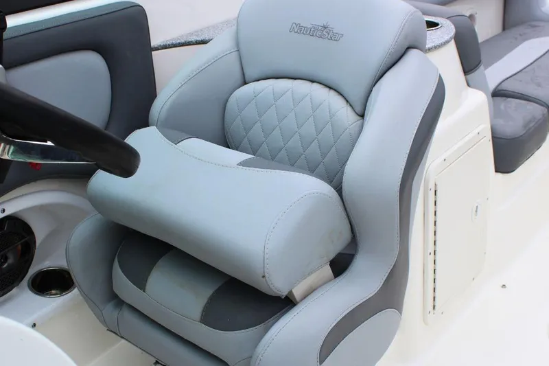 Slide: The Image of 2023 NauticStar 243 DC Deck boat seat with elegant design and comfort. - 11