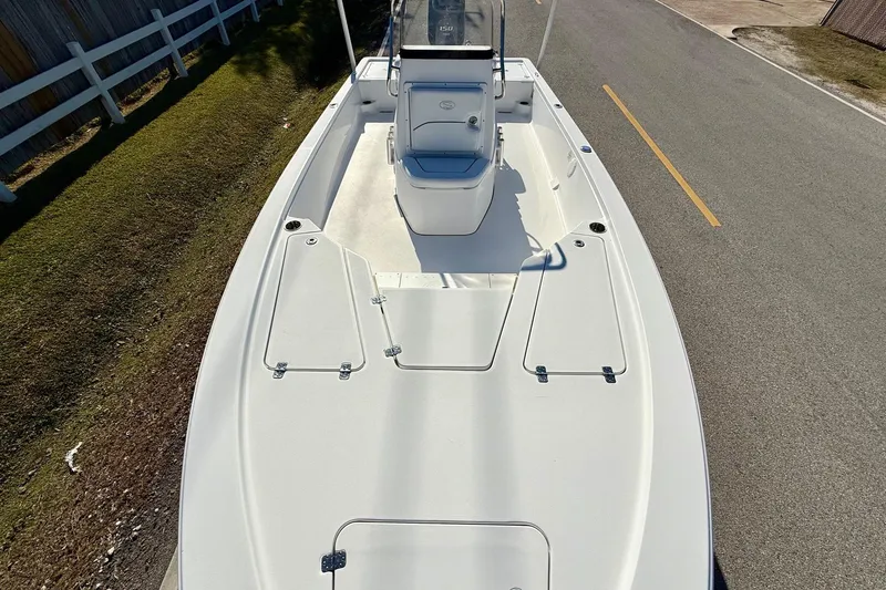 Slide: The Image of 2014 Sportsman Tournament 214 Bay Boat on road, top view. - 15