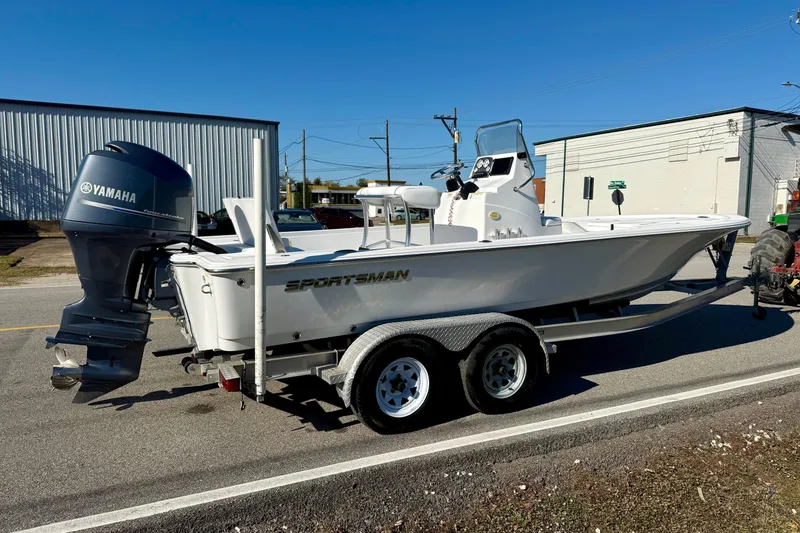 Slide: The Image of 2014 Sportsman Tournament 214 Bay Boat on trailer with Yamaha outboard engine. - 4