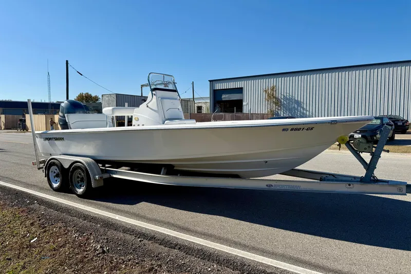 Slide: The Image of 2014 Sportsman Tournament 214 Bay Boat on trailer, parked outdoors. - 5
