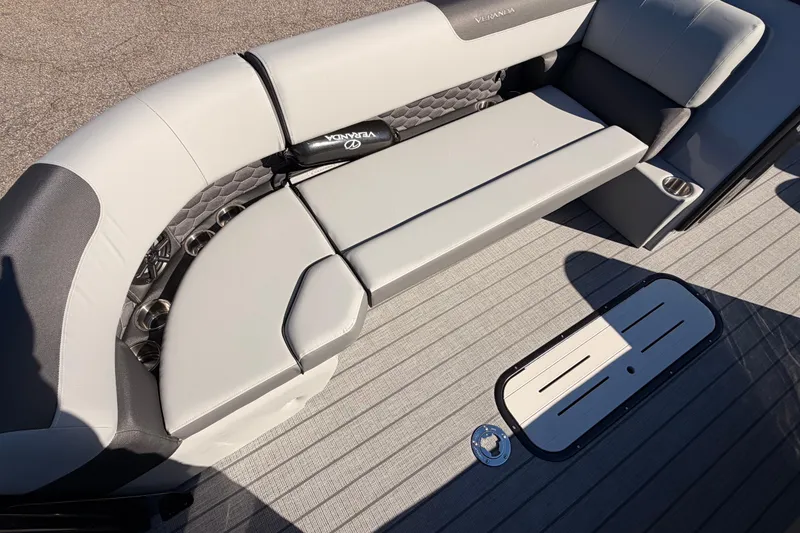 Slide: The Image of 2026 Veranda Relax VR 265 VL boat interior with gray seating and cup holders. - 10