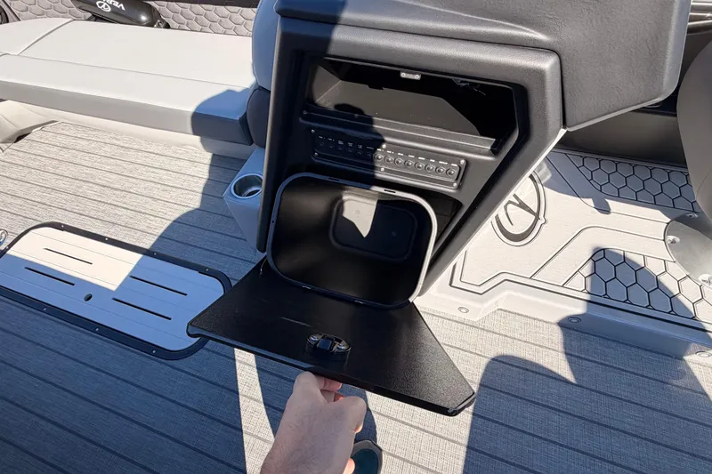 Slide: The Image of Interior of 2026 Veranda Relax VR 265 VL boat with storage compartment open. - 12