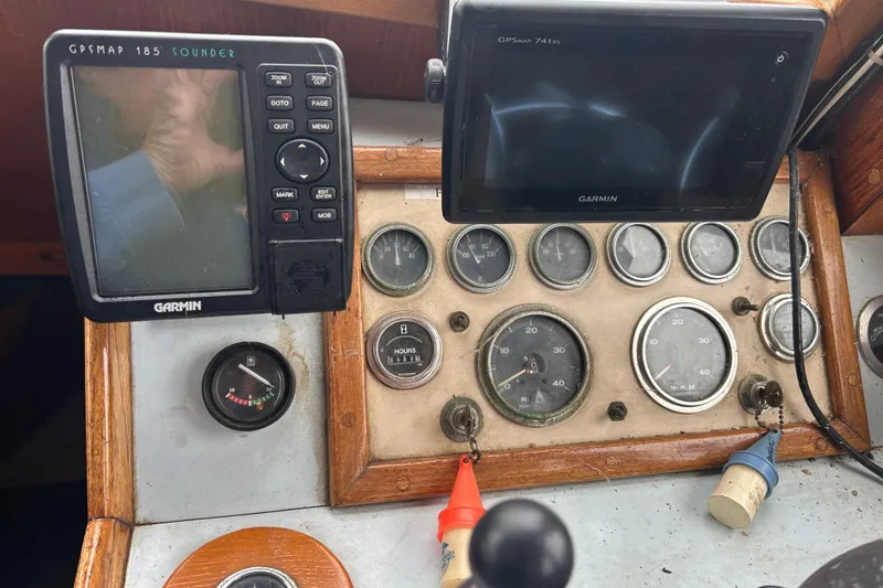 Slide: The Image of 1976 Bristol Trawler dashboard with Garmin GPS and various gauges. - 20