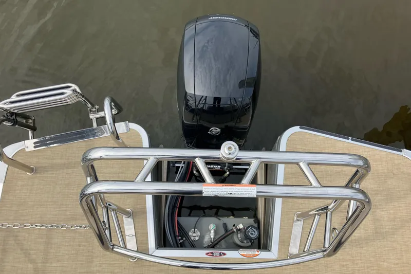 Slide: The Image of 2024 Harris HCX23 boat with Mercury outboard motor and stainless steel railing. - 7