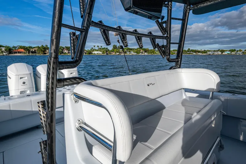 Slide: The Image of 2024 Contender 44 ST boat interior with seating and ocean view. - 8