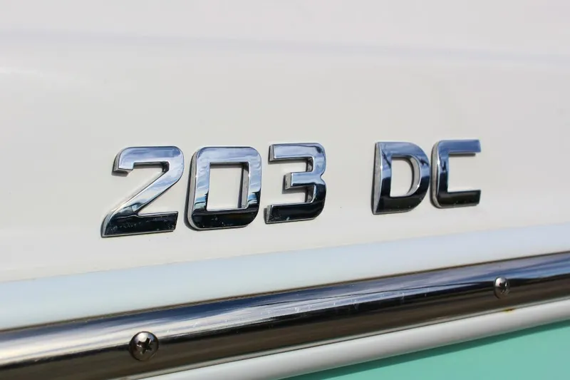 Slide: The Image of Close-up of 2024 NauticStar 203 DC Deck boat emblem. - 6