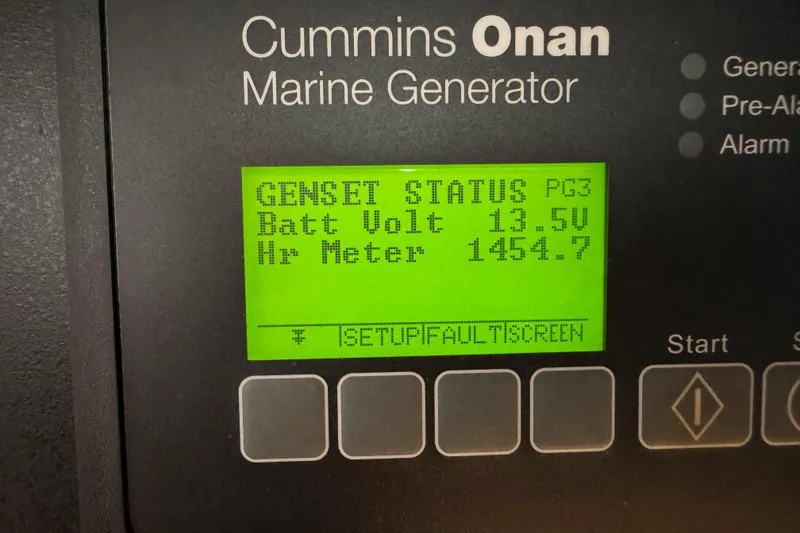 Slide: The Image of Cummins Onan marine generator display on 2022 Tiara Yachts 43 Open. - 14