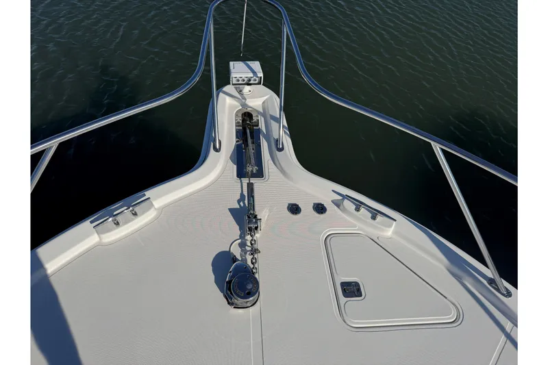 Slide: The Image of Bow view of 2022 Tiara Yachts 43 Open, featuring anchor and railing. - 49