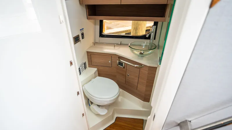 Slide: The Image of Interior view of 2026 Boston Whaler 365 Conquest bathroom. - 26