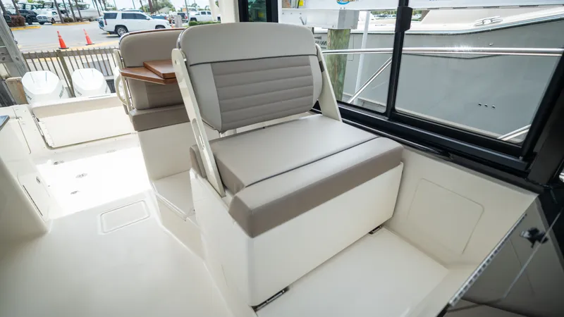 Slide: The Image of Interior of 2026 Boston Whaler 365 Conquest with comfortable seating. - 29