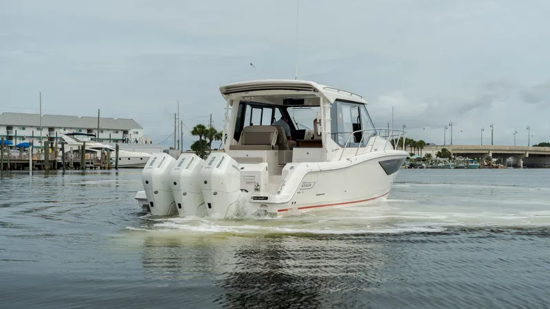 Slide: The Image of 2026 Boston Whaler 365 Conquest on calm waters. - 3