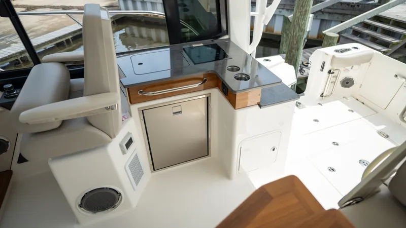 Slide: The Image of Interior of 2026 Boston Whaler 365 Conquest with modern amenities. - 31