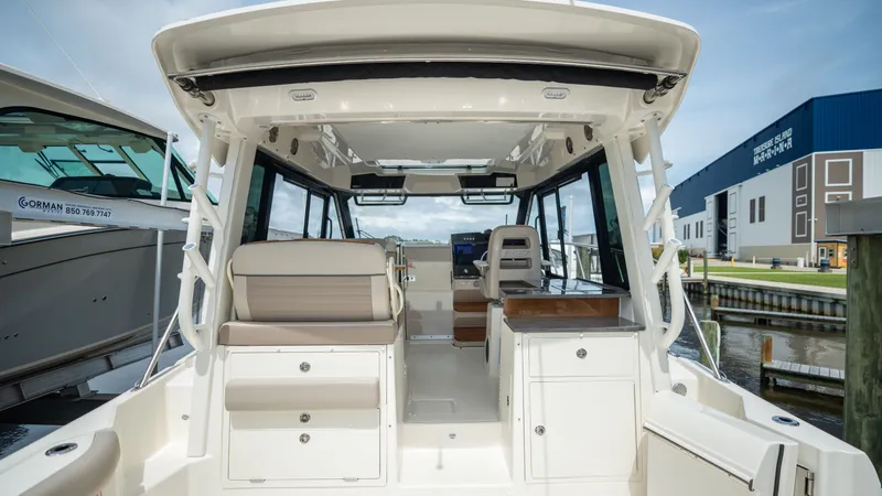 Slide: The Image of Interior of 2026 Boston Whaler 365 Conquest boat at dock. - 34