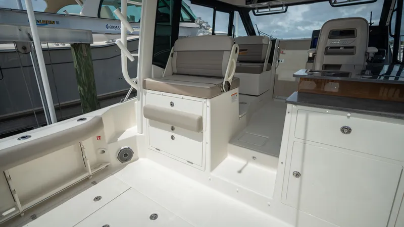 Slide: The Image of Interior of 2026 Boston Whaler 365 Conquest with seating and storage. - 37